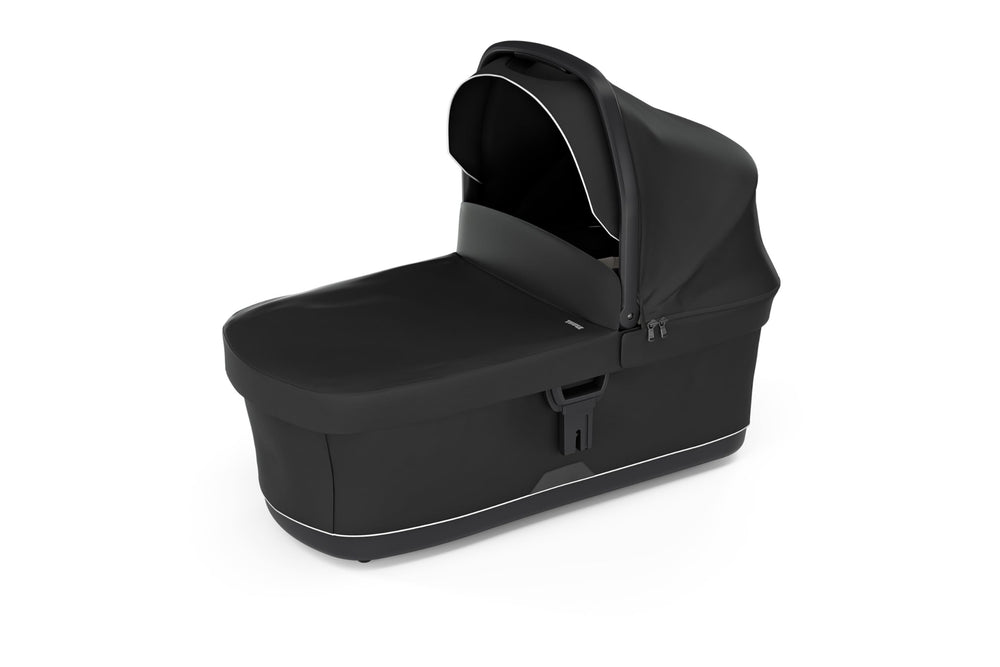 Thule Bassinet Soft Beige ready for strolls and errands with baby nearby.