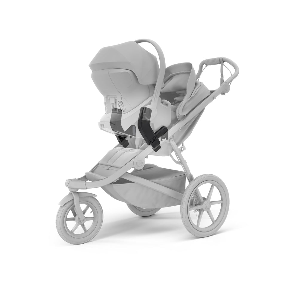 Installation of the adapter on the Urban Glide 3 demonstrates quick, tool-free setup.