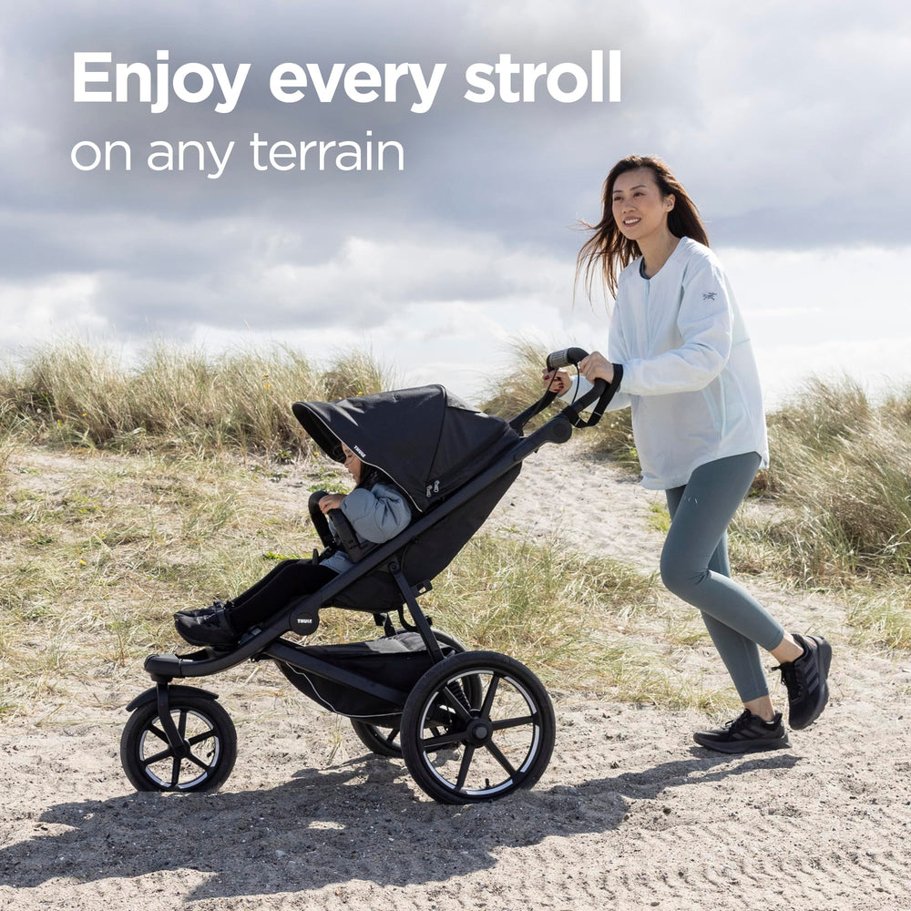 Thule Urban Glide 3 full-coverage canopy with peek window protecting baby
