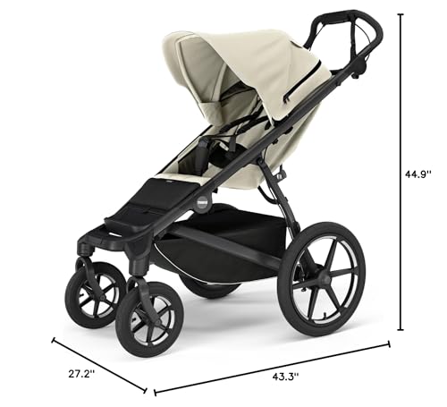 Thule Urban Glide 4-Wheel integrated hand brake for confident control.
