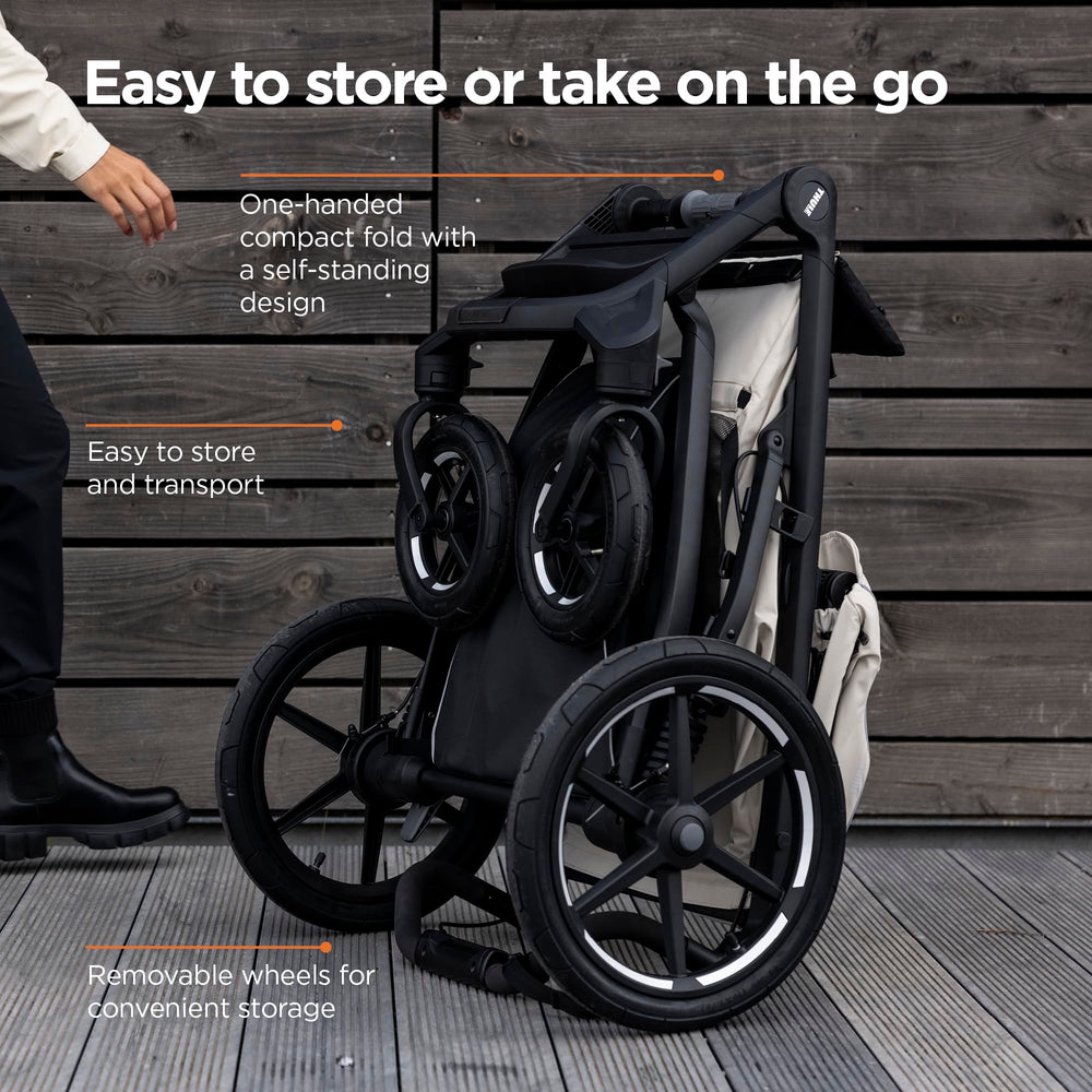 Thule Urban Glide 4-Wheel large storage basket keeps essentials handy.