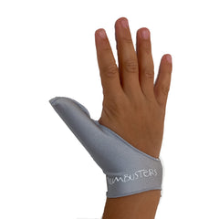 Thumbusters silver glove-on-thumb device supports self-control during bedtime and quiet moments.