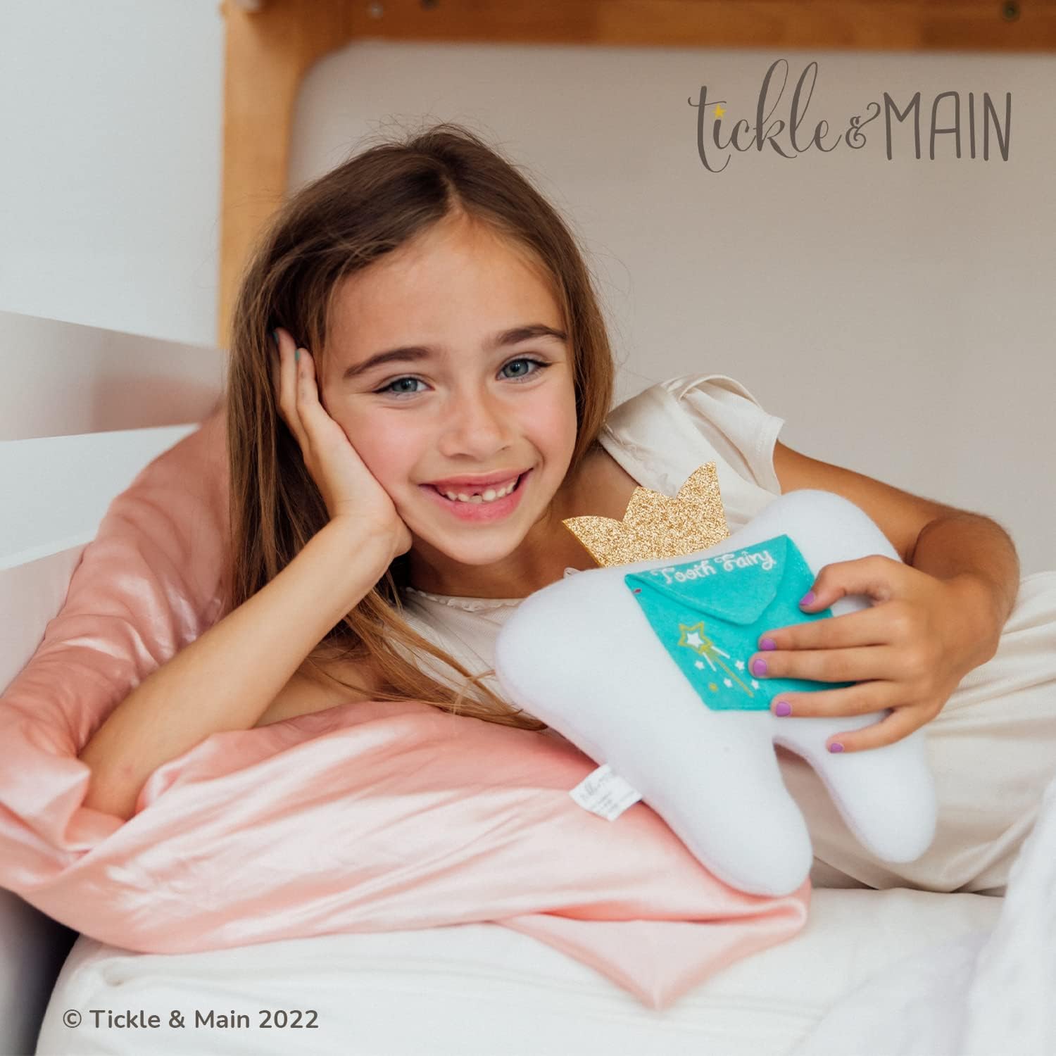 A child uses the kit to create a personal tooth fairy tradition.