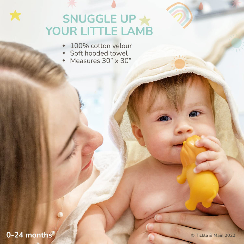 Tickle & Main Noah’s Ark colorful bath set brightens newborn bath moments.