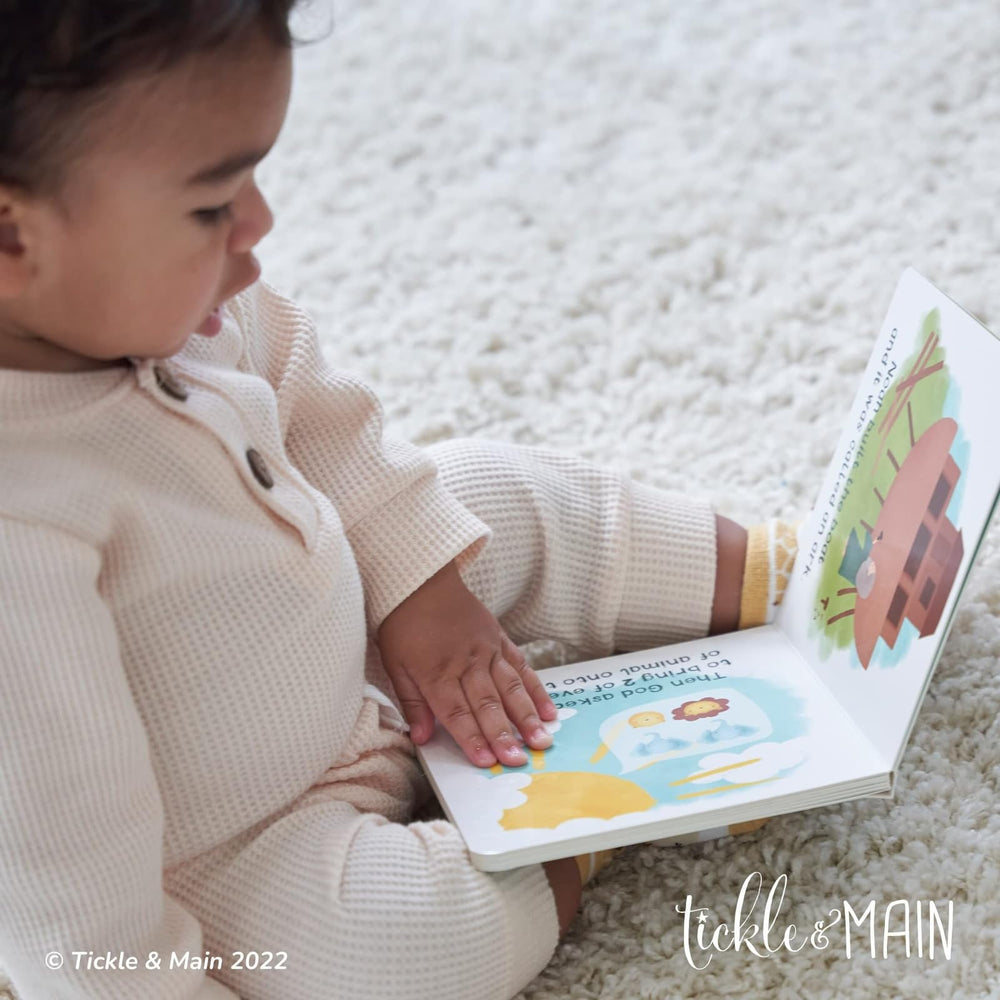 Tickle and Main gift set inside shows a complete newborn bundle.