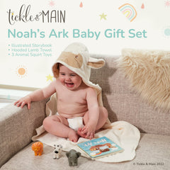 Tickle & Main Noah’s Ark storybook shown beside bath toys for storytelling.