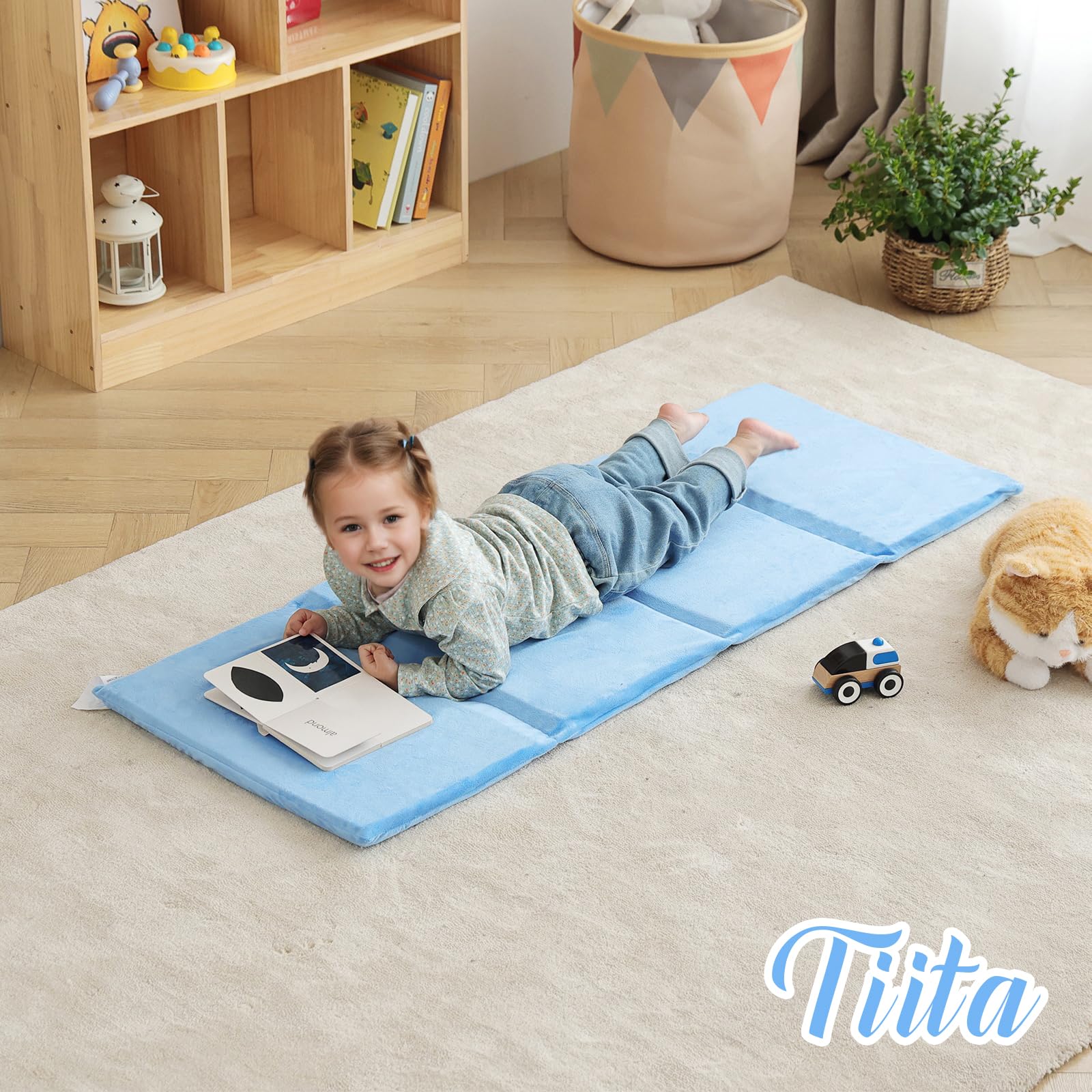 Tiita Kids Nap Mat blue used as a dedicated napping area
