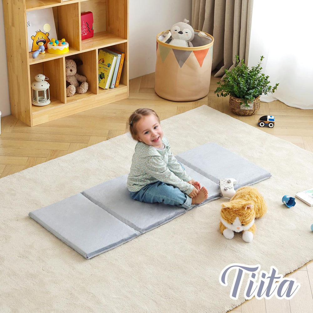 Machine washable cover on Tiita Nap Mat simplifies cleaning after busy days.