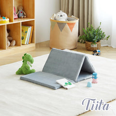 Tiita Kids Nap Mat opened flat on the floor for nap or playtime.