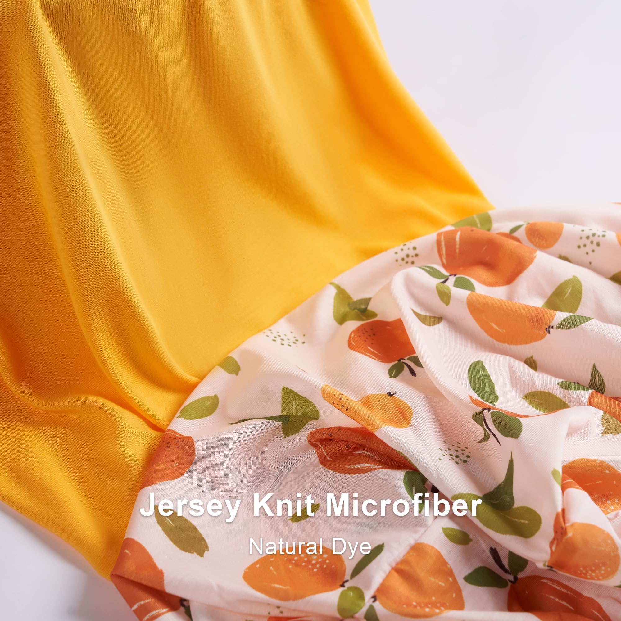 TILLYOU floral-pattern changing pad cover adds a cheerful nursery touch.