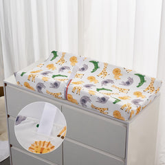 TILLYOU changing pad cover with elastic bottom and buckle holes keeps the pad secure.
