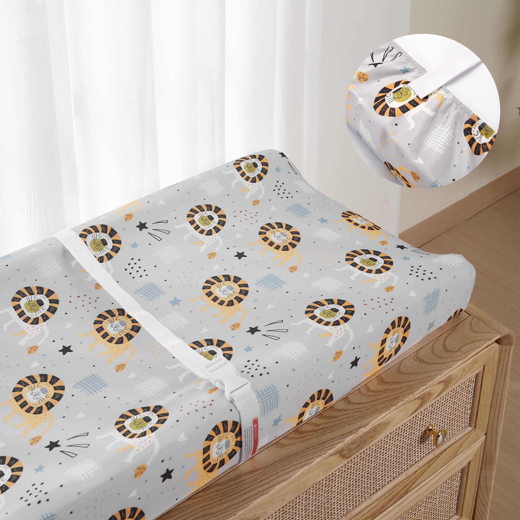 TILLYOU changing pad cover with elastic bottom secures placement on pads.