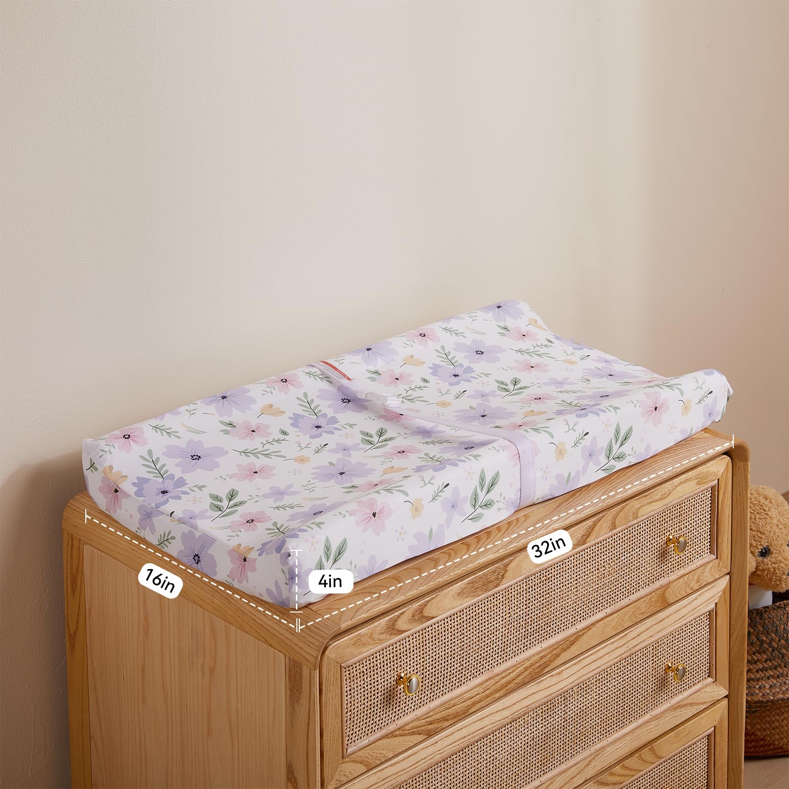 TILLYOU changing pad cover demonstrates secure fit for 32-34 by 16 inch contoured pads.