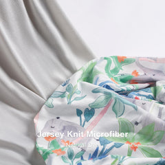 TILLYOU Grey changing pad cover close-up highlighting durable, wrinkle-resistant material.