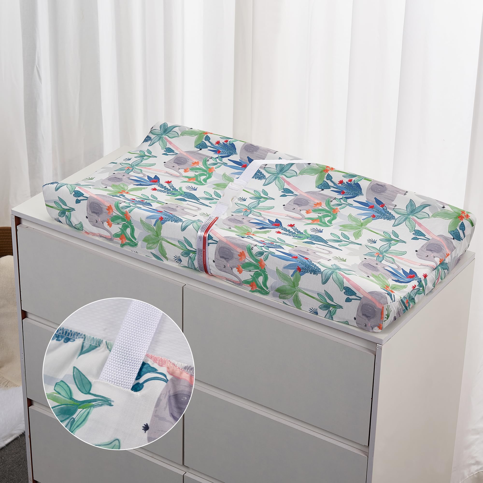 TILLYOU elastic bottom and buckle detail for secure changing pad fit.