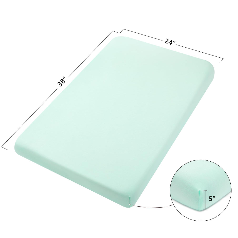 TILLYOU mini crib fitted sheet in light gray wrapped snugly for a secure fit.