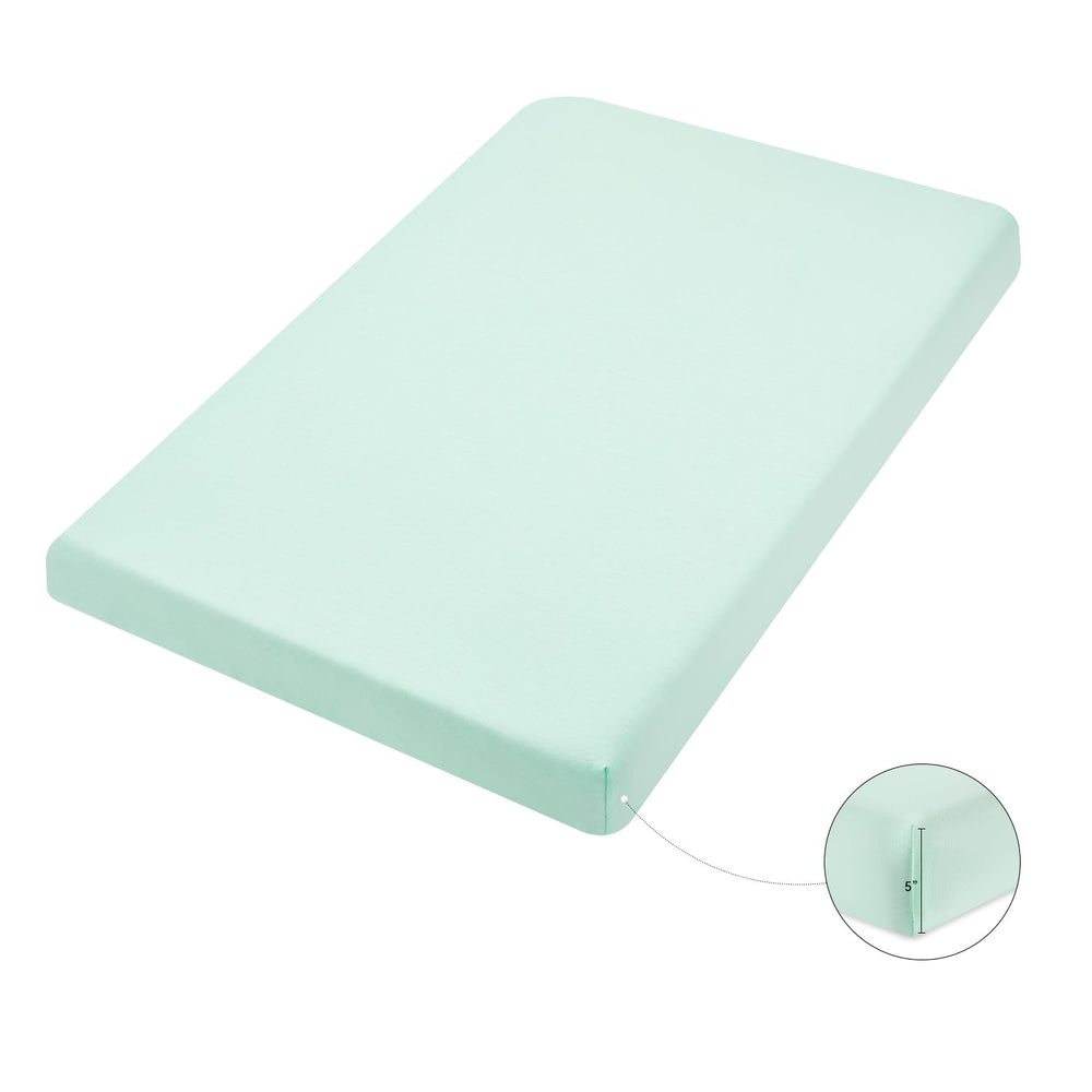 TILLYOU light green solid mini crib sheet closeup showing easy fit