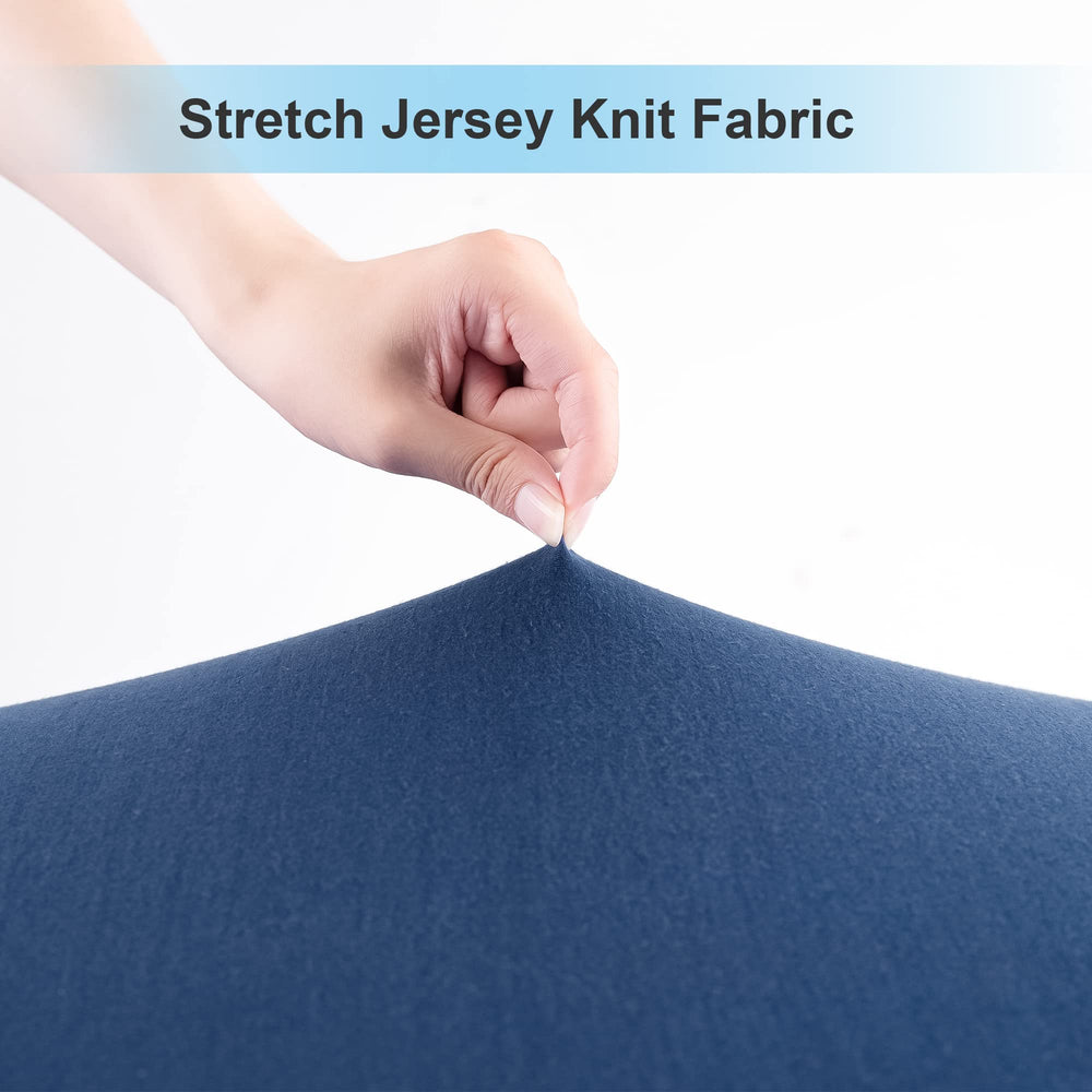 Sheet on mini crib mattress demonstrates snug, soft texture.