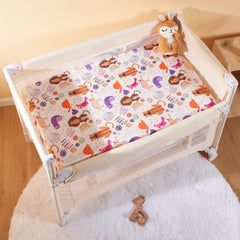 TILLYOU mini crib sheets fitted with dot printing for easy care.