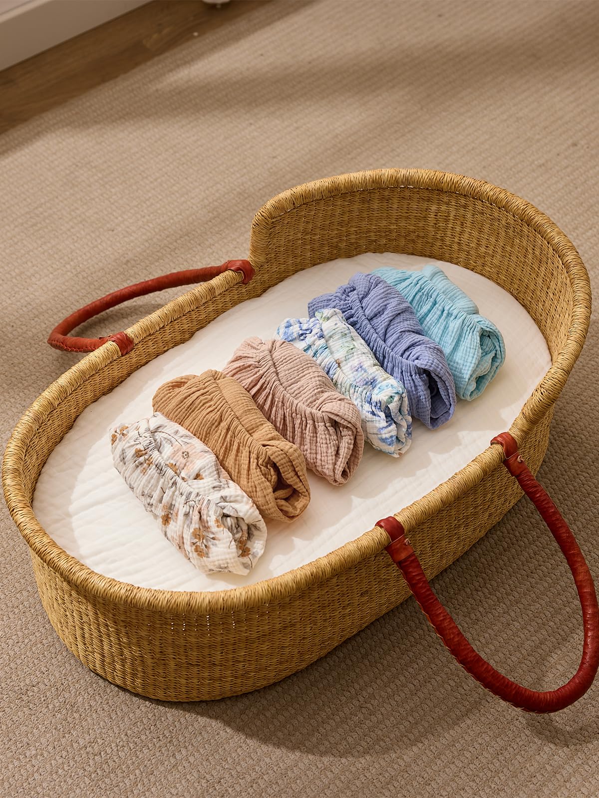 TILLYOU bassinet sheet with full-loop elastic hem demonstrating secure fit