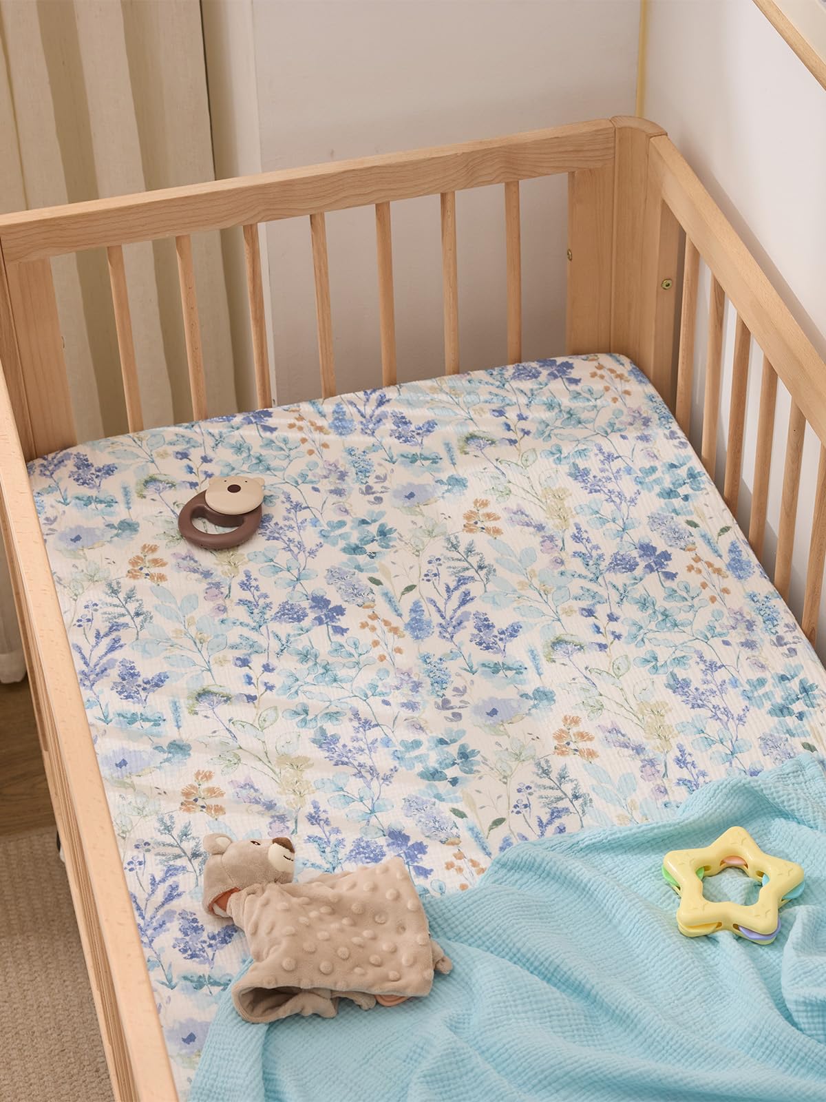 TILLYOU machine-washable crib sheet, durable color retention after cold cycles.