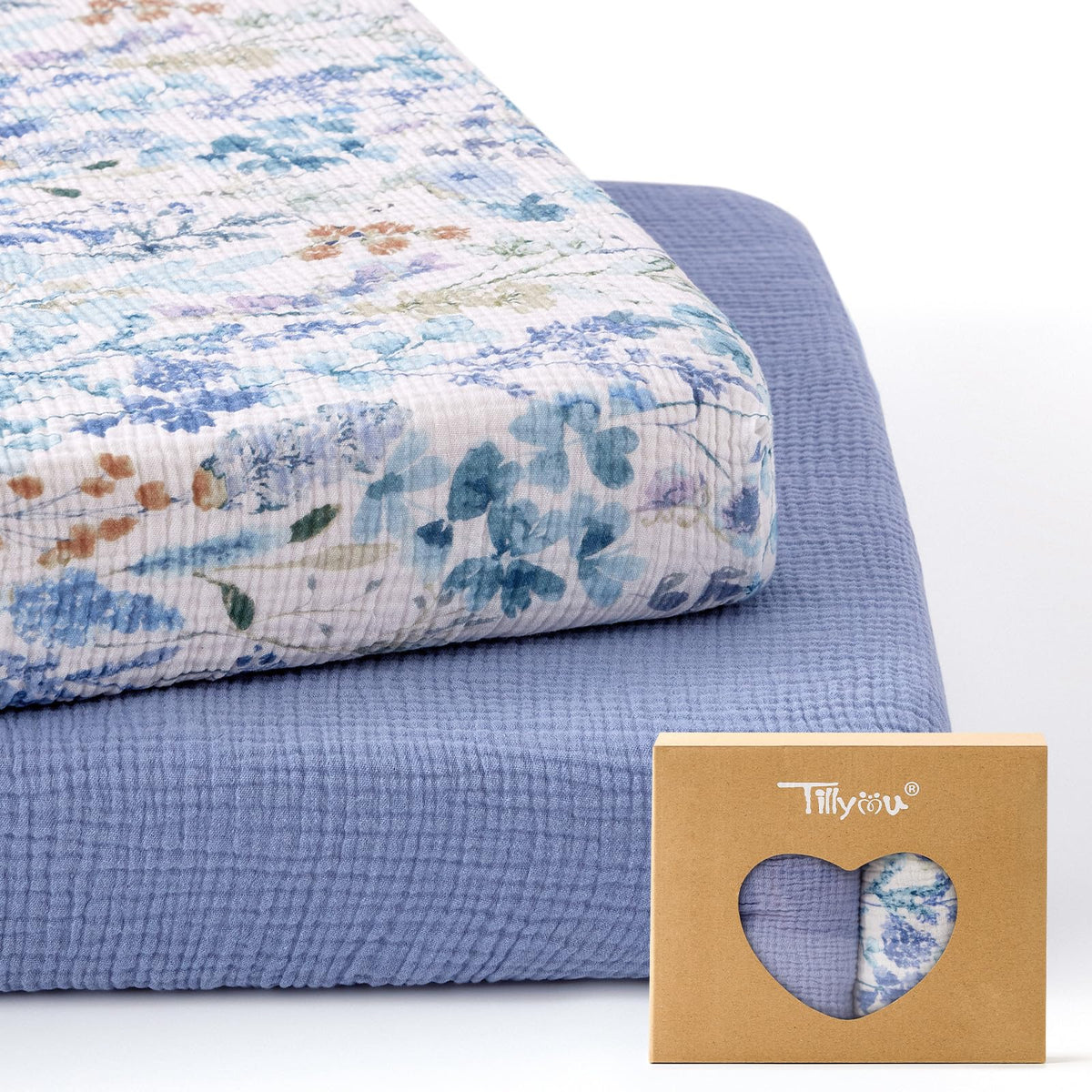 TILLYOU Muslin mini crib sheet in blue flower fits Pack N Play securely.