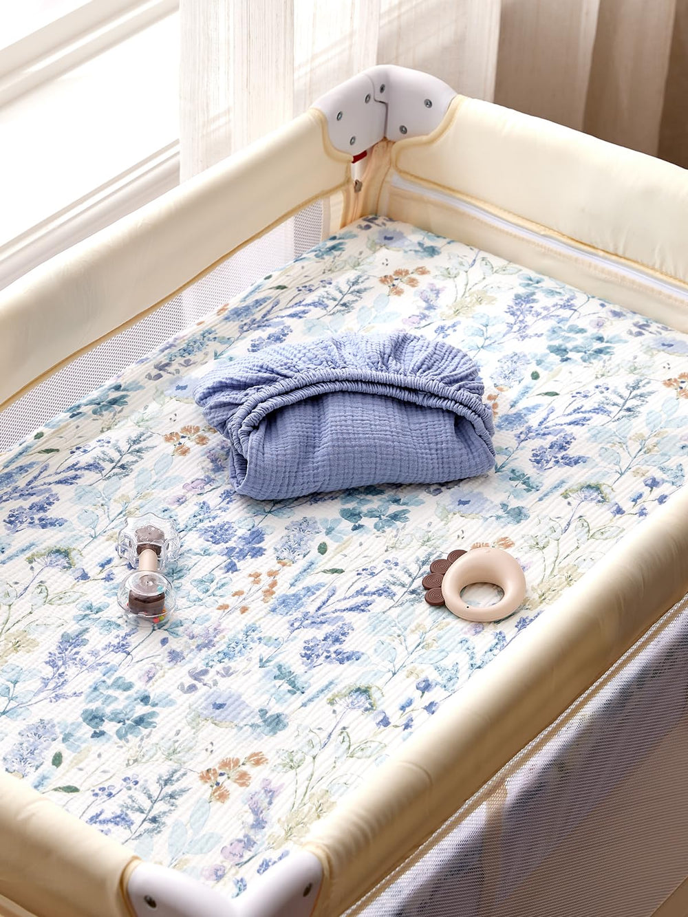 TILLYOU mini crib sheet blue flower, machine washable for easy care.