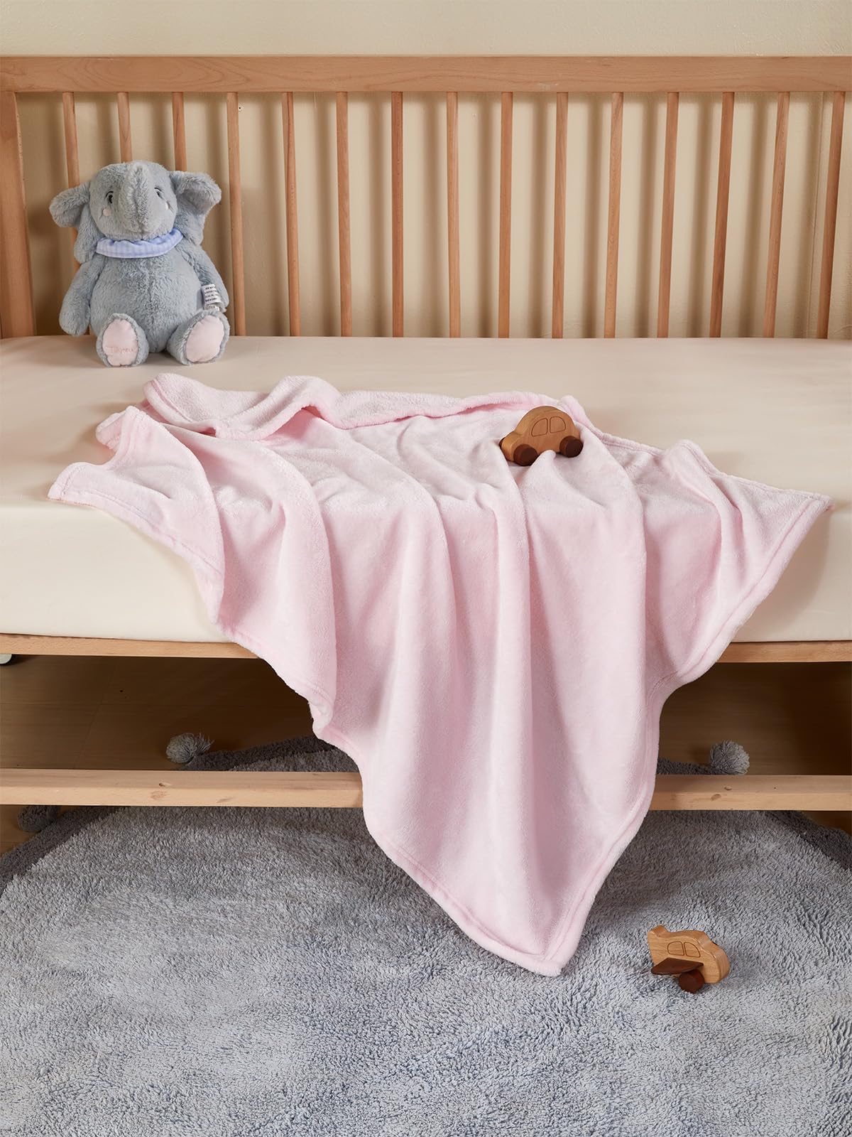TILLYOU makes a thoughtful newborn or baby shower gift blanket pink