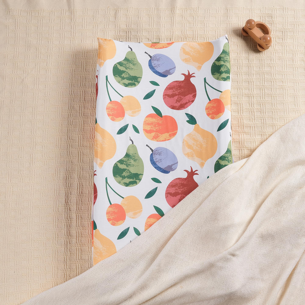 TILLYOU orangish changing pad cover keeps changing area tidy and protected