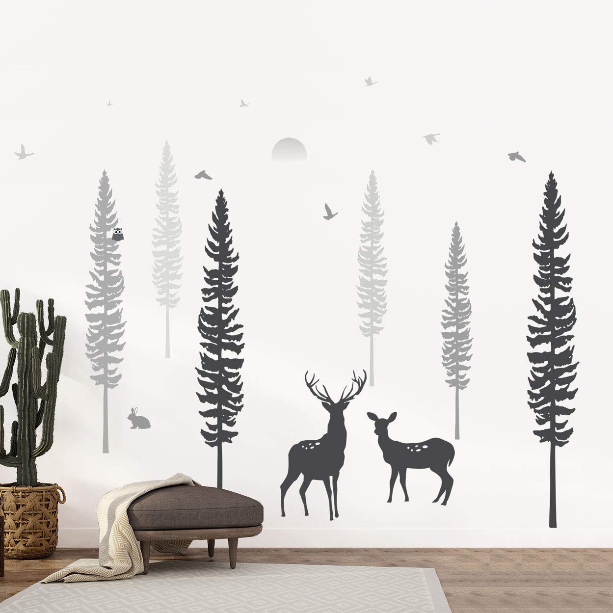 Timber Artbox pine tree wall decals create a cozy forest vibe in the playroom