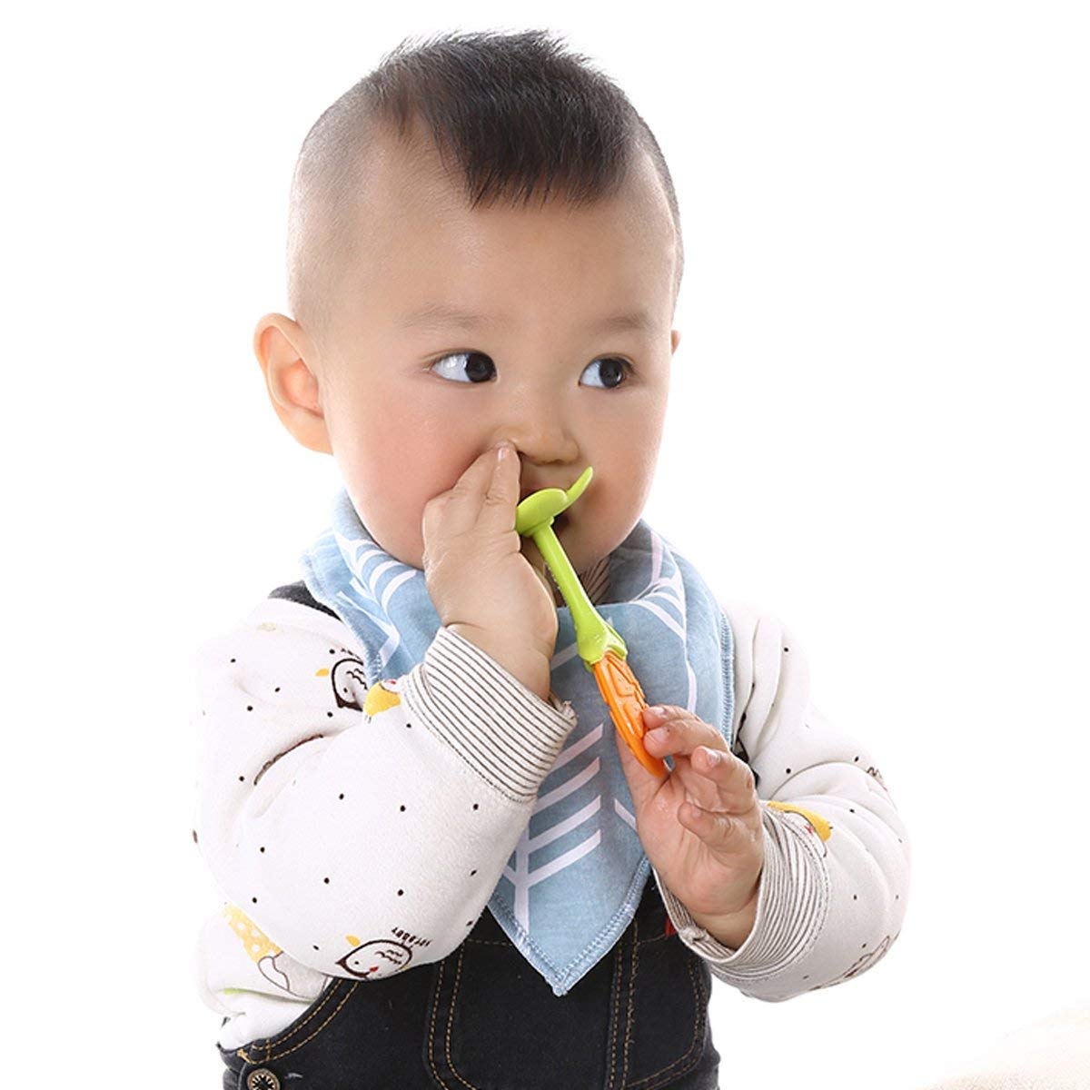 Tinabless teething keys during playtime; safe silicone for toddlers.