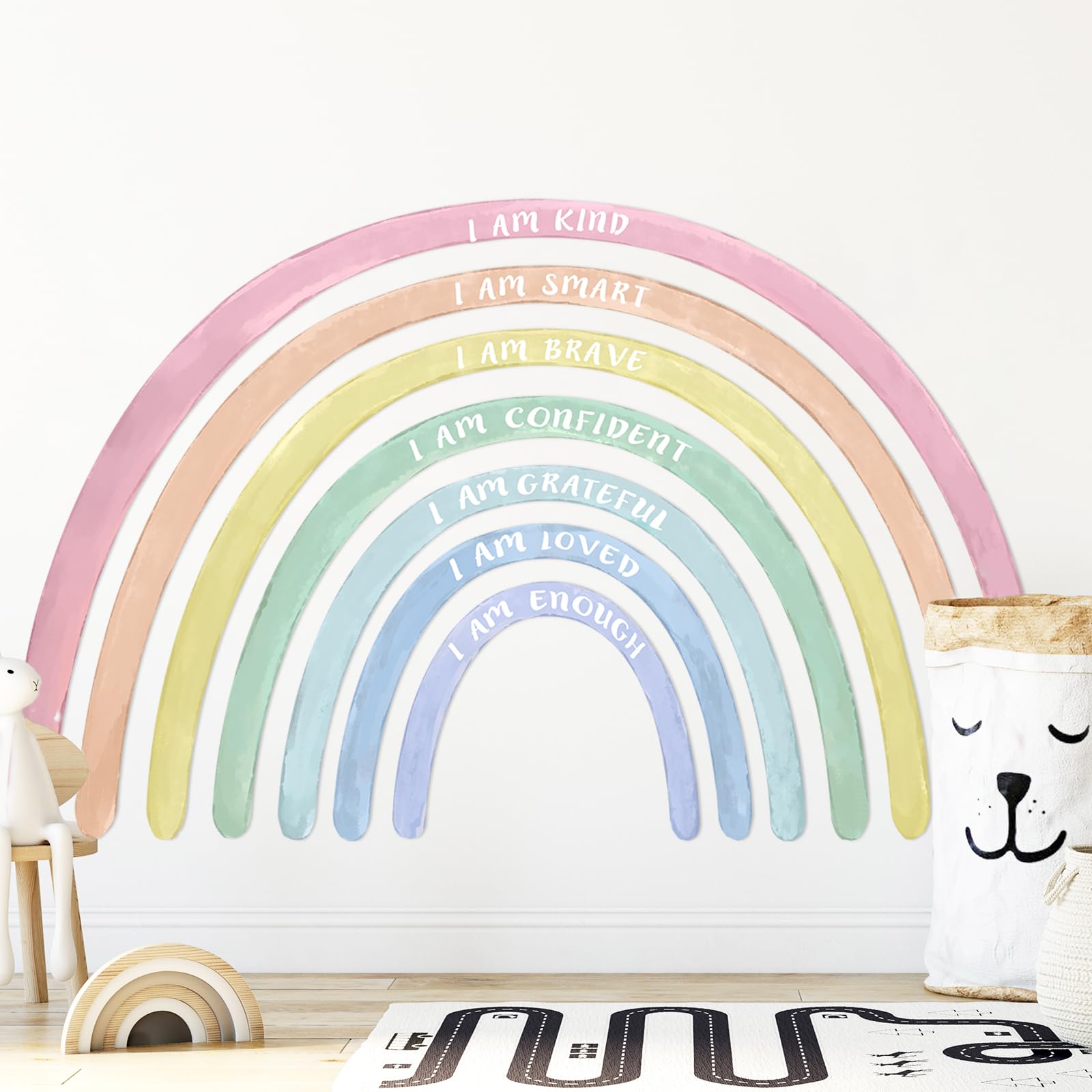 Tinideya rainbow wall decal assembly adds pastel charm to a kid's room.