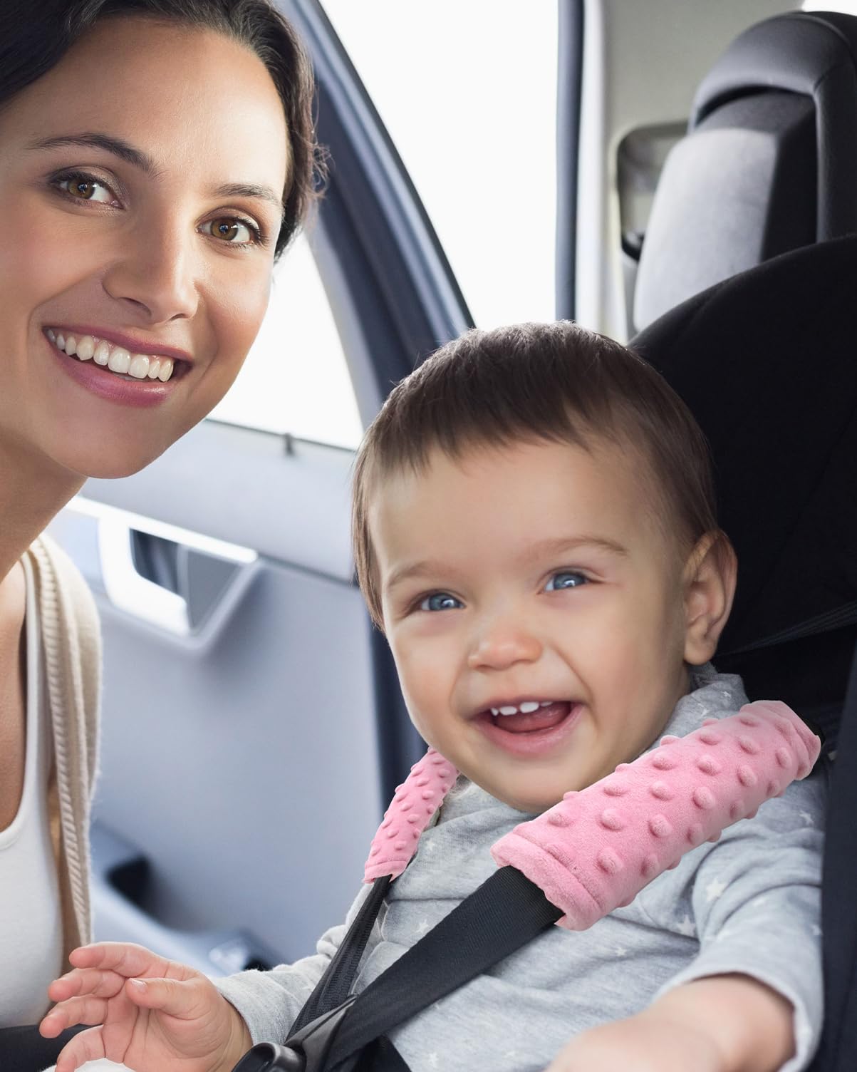 TinlyFinly car seat belt cover installed on a strap for quick comfort.