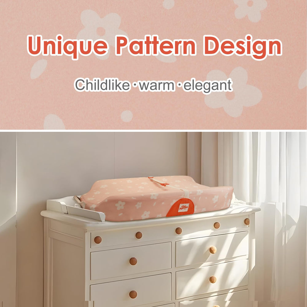 Tiny Marvels nursery scene with the non-slip changing pad in use