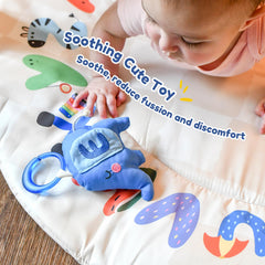 Tiny Marvels house arch mirror encourages visual focus during tummy time play