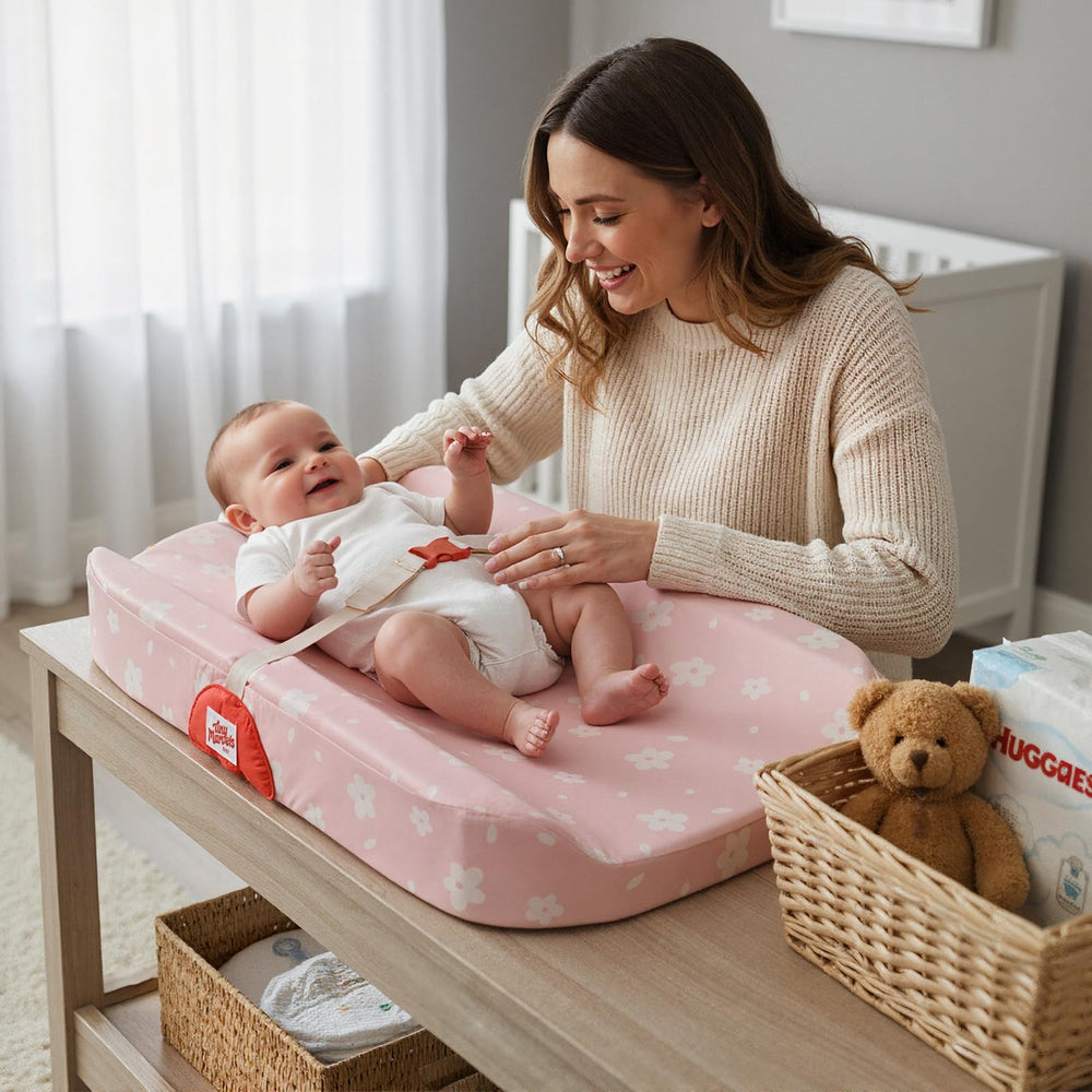 Tiny Marvels change pad with contoured sides for secure positioning