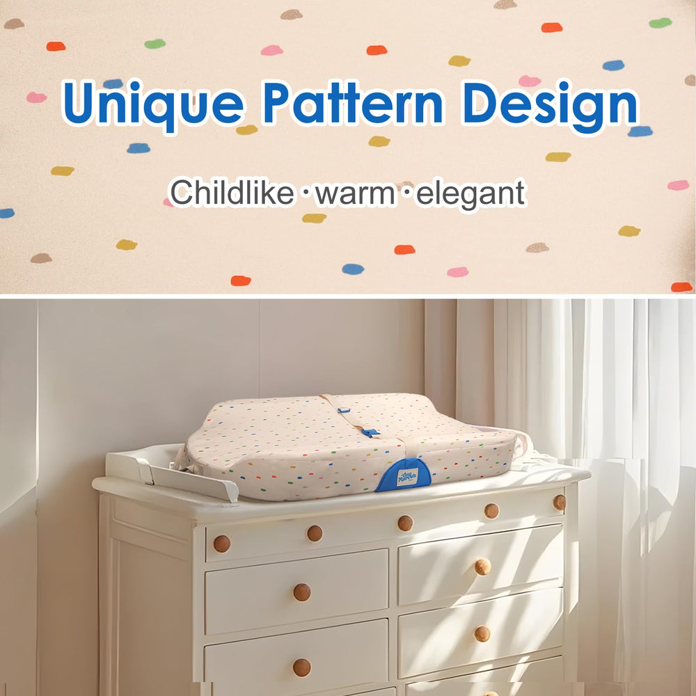Tiny Marvels contoured sides designed to cradle baby during changes