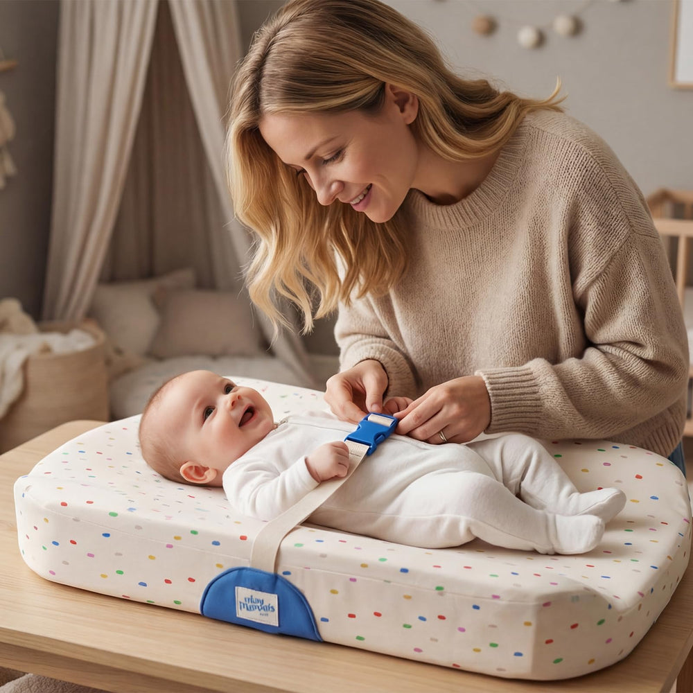 Tiny Marvels changing pad side-strap closeup highlighting stability and security