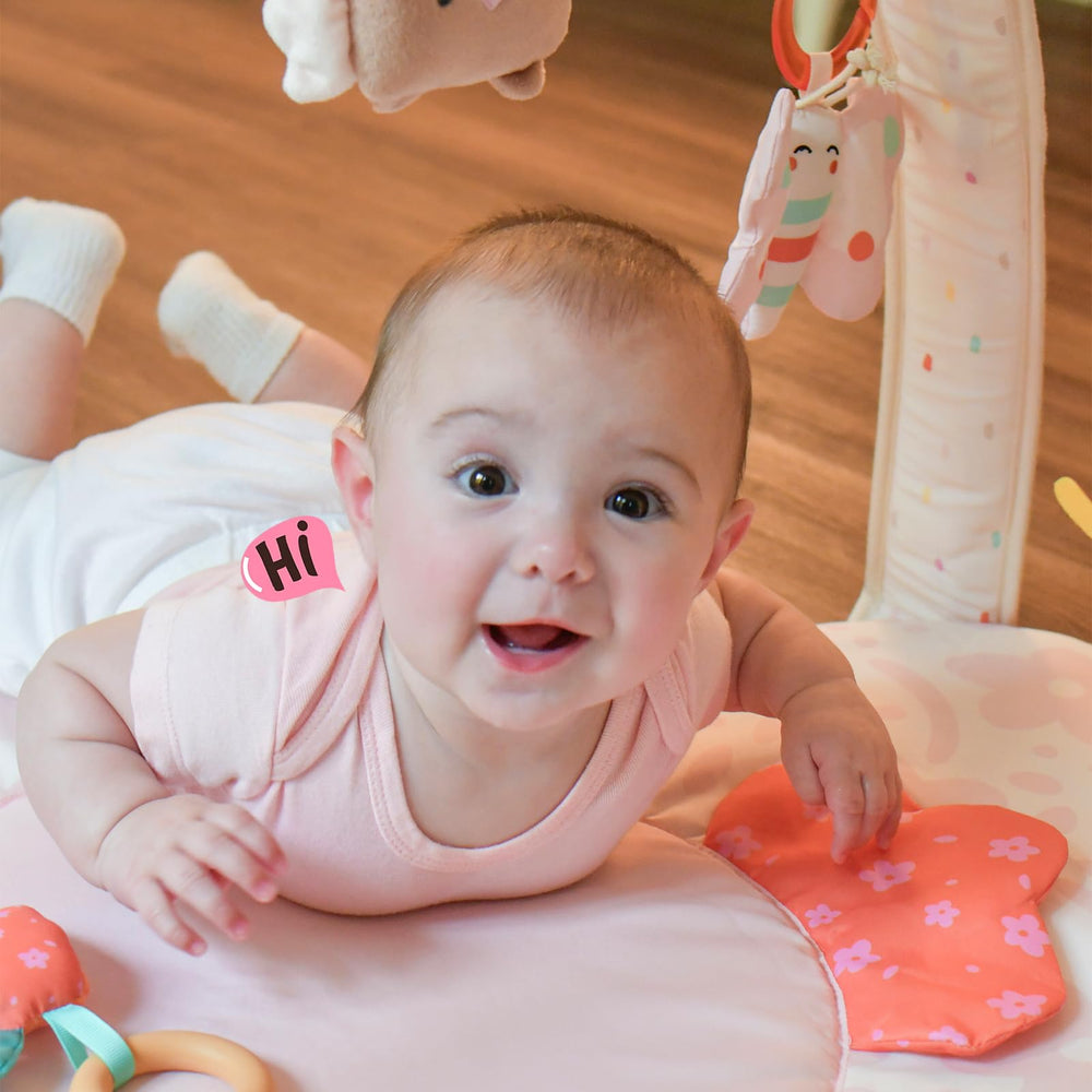 Tiny Marvels blush bloom design complements nurseries while entertaining baby.