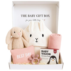 Tiny Treasures newborn gift basket with plush bunny and swaddle for cozy baby moments.