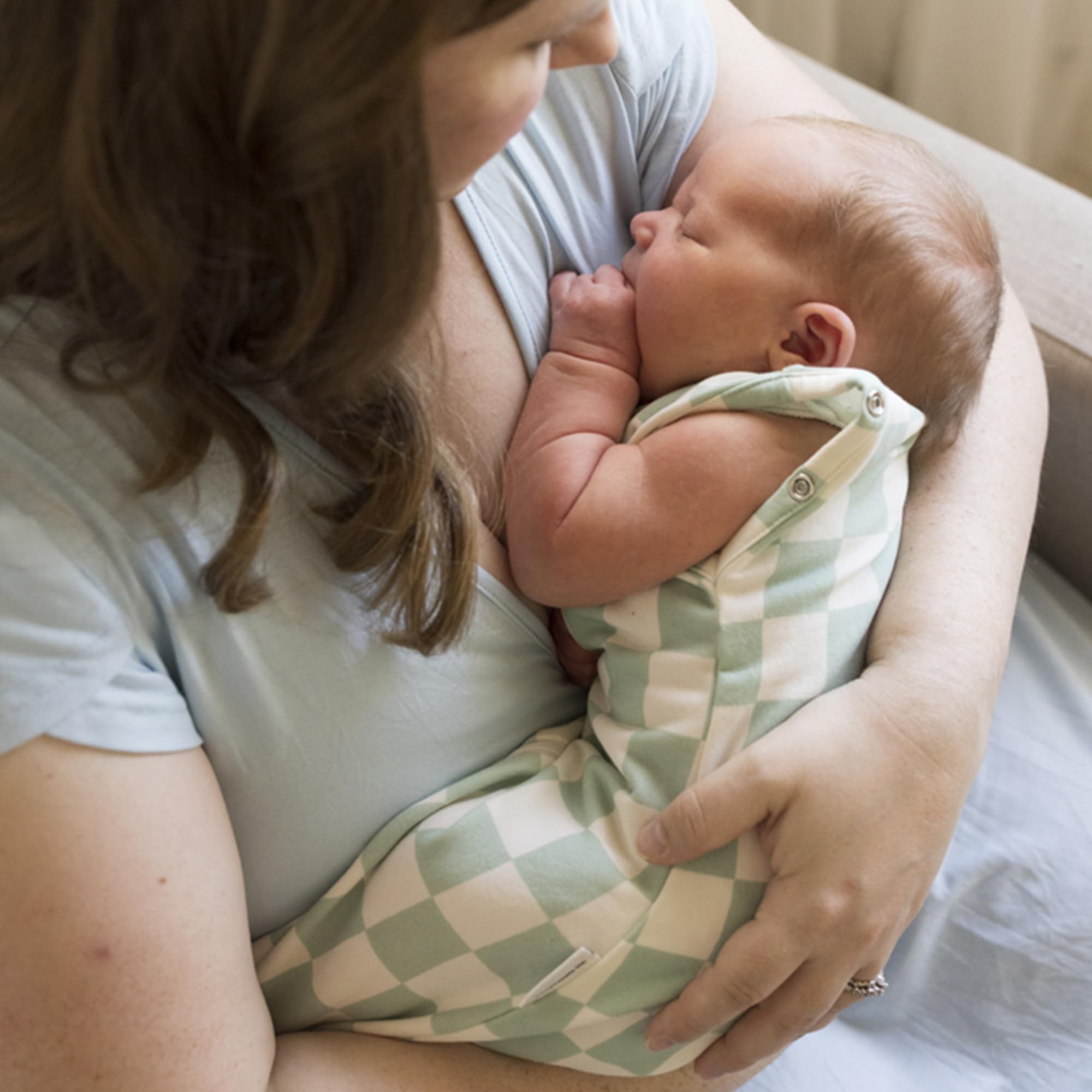 1.0 tog micro-fleece fabric feels soft and breathable for baby comfort.
