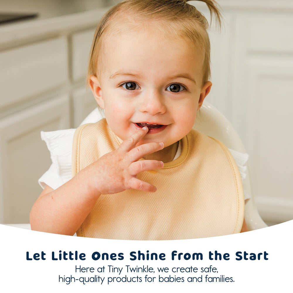 Soft Kaffle fabric is gentle on baby skin via Tiny Twinkle bibs.