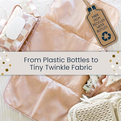 Tiny Twinkle changing pad arrives gift-ready for a newborn shower.