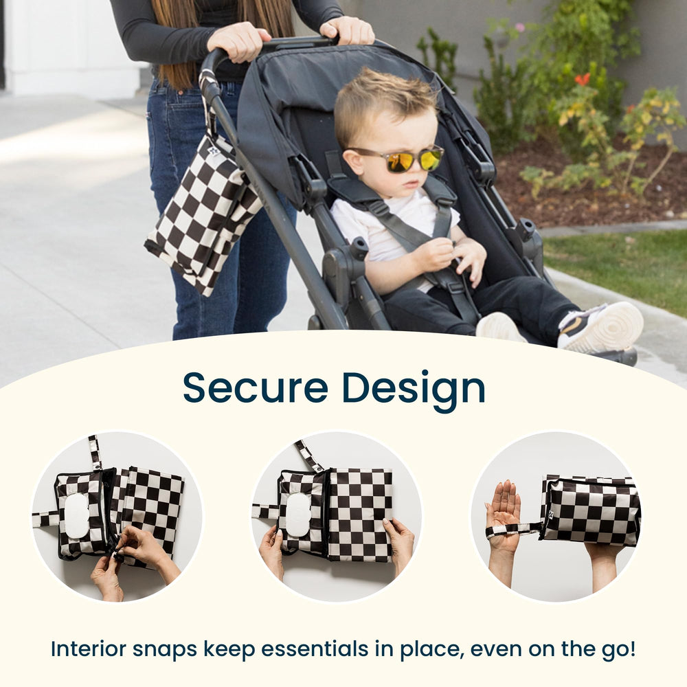 Tiny Twinkle changing pad on a car seat for quick mid-ride changes.