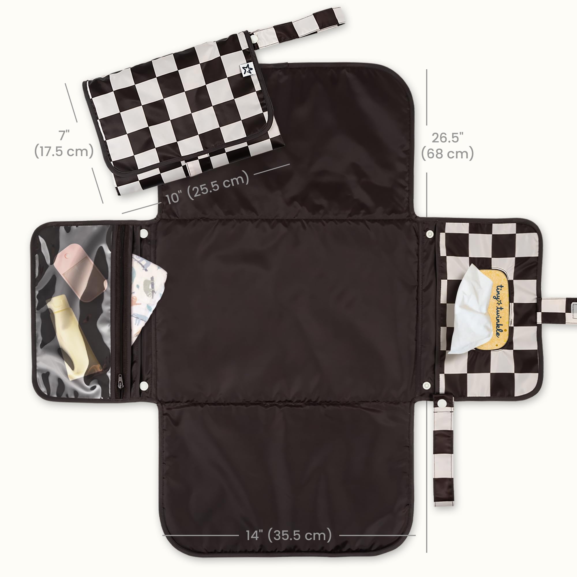 Tiny Twinkle changing pad featuring built-in wipes pocket for fast access.