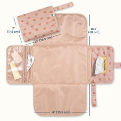 Tiny Twinkle changing pad with built-in wipes pocket for quick access