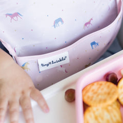 Tiny Twinkle easy-on-off bib with soft closure for comfortable wear.