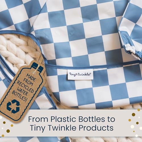 Tiny Twinkle flutter print bib adds style and protection during meals.