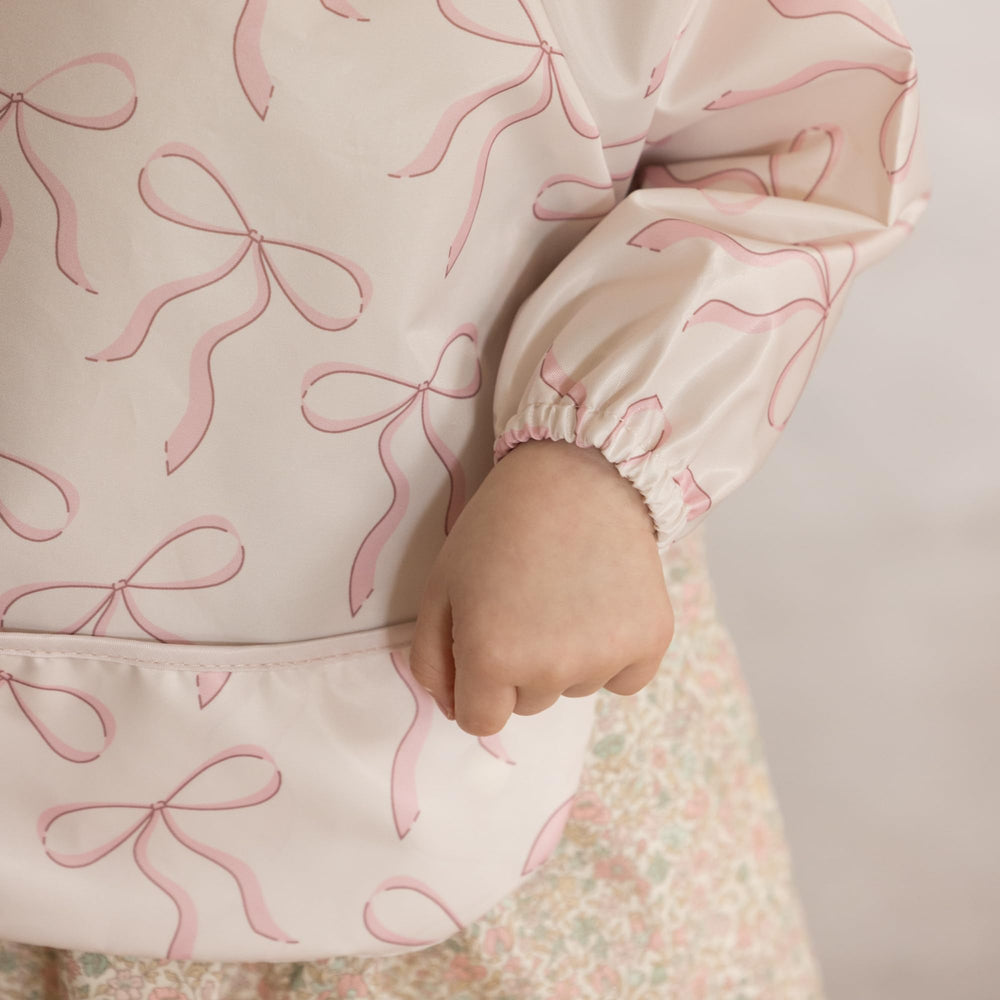 Tiny Twinkle elastic cuffs provide a soft, flexible fit during feeding.