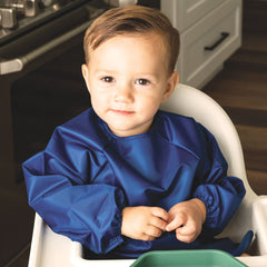 Elastic cuffs and full-body coverage ensure comfortable, mess-free mealtimes.